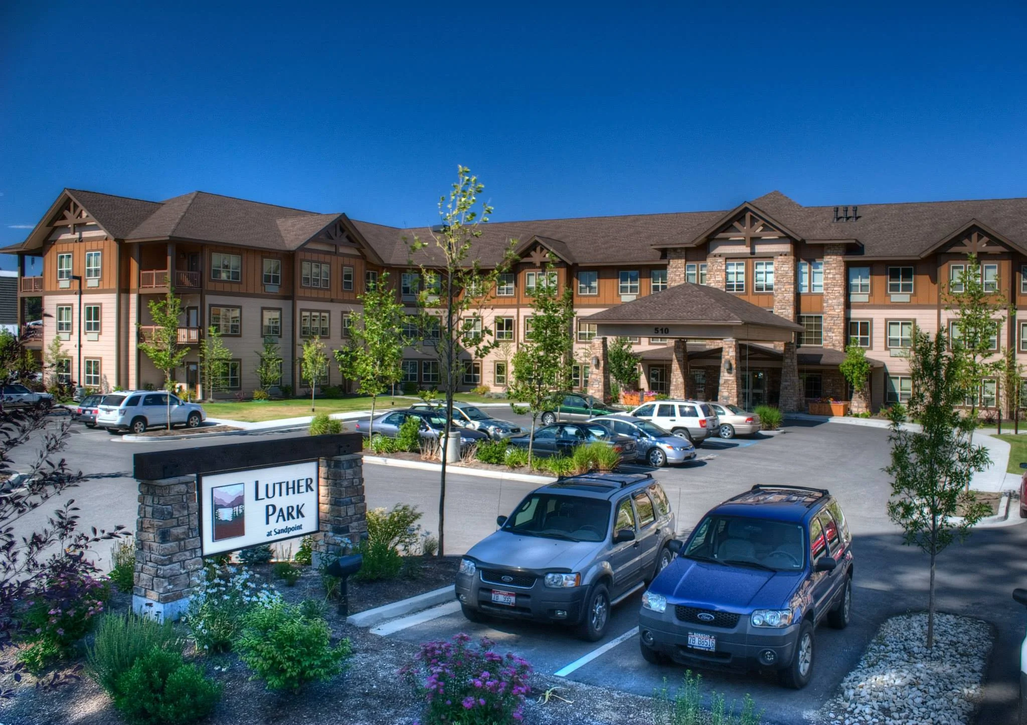 A closer view of the parking lot and building exterior