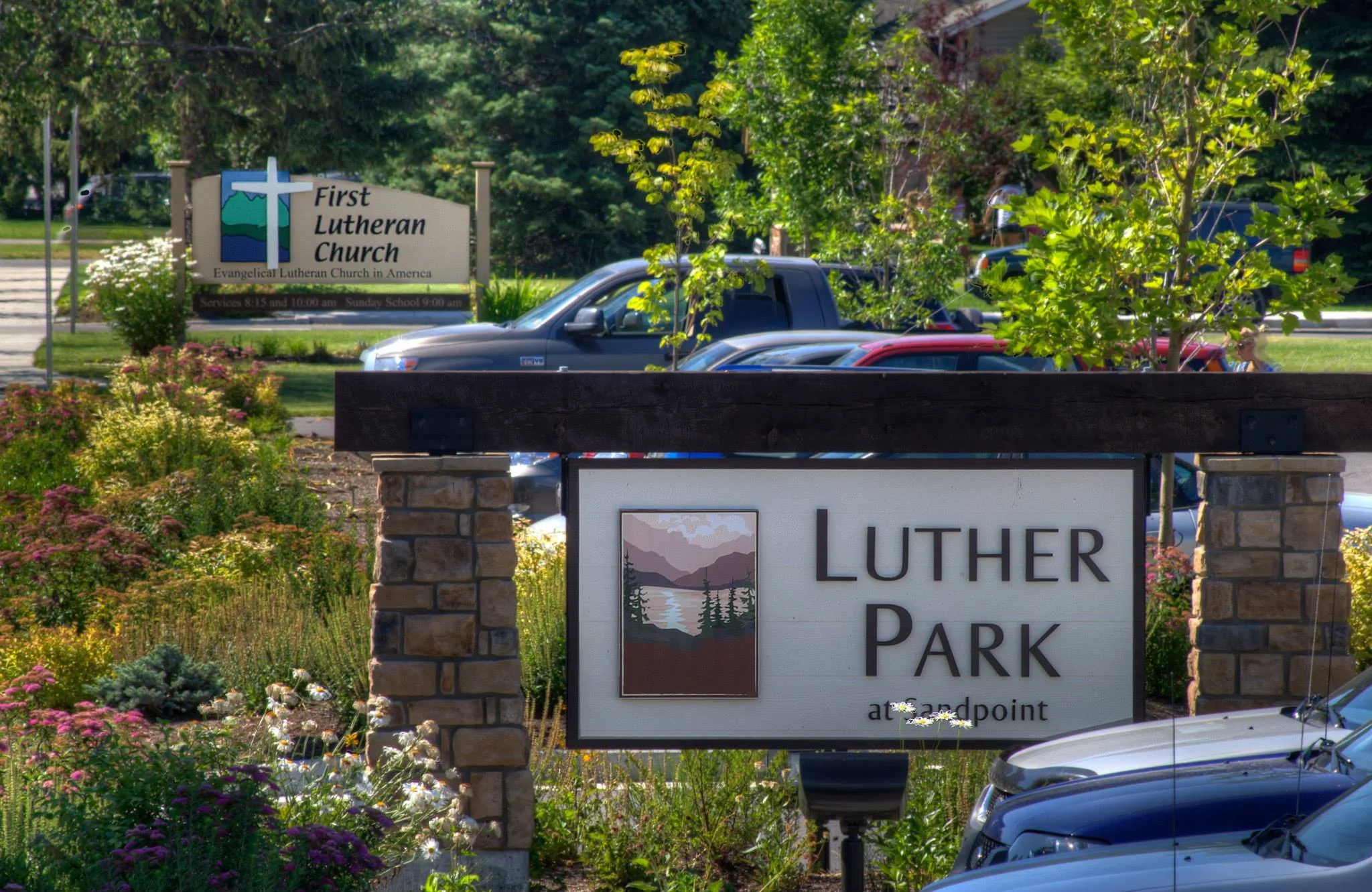 The Luther Park sign surrounded by greenery